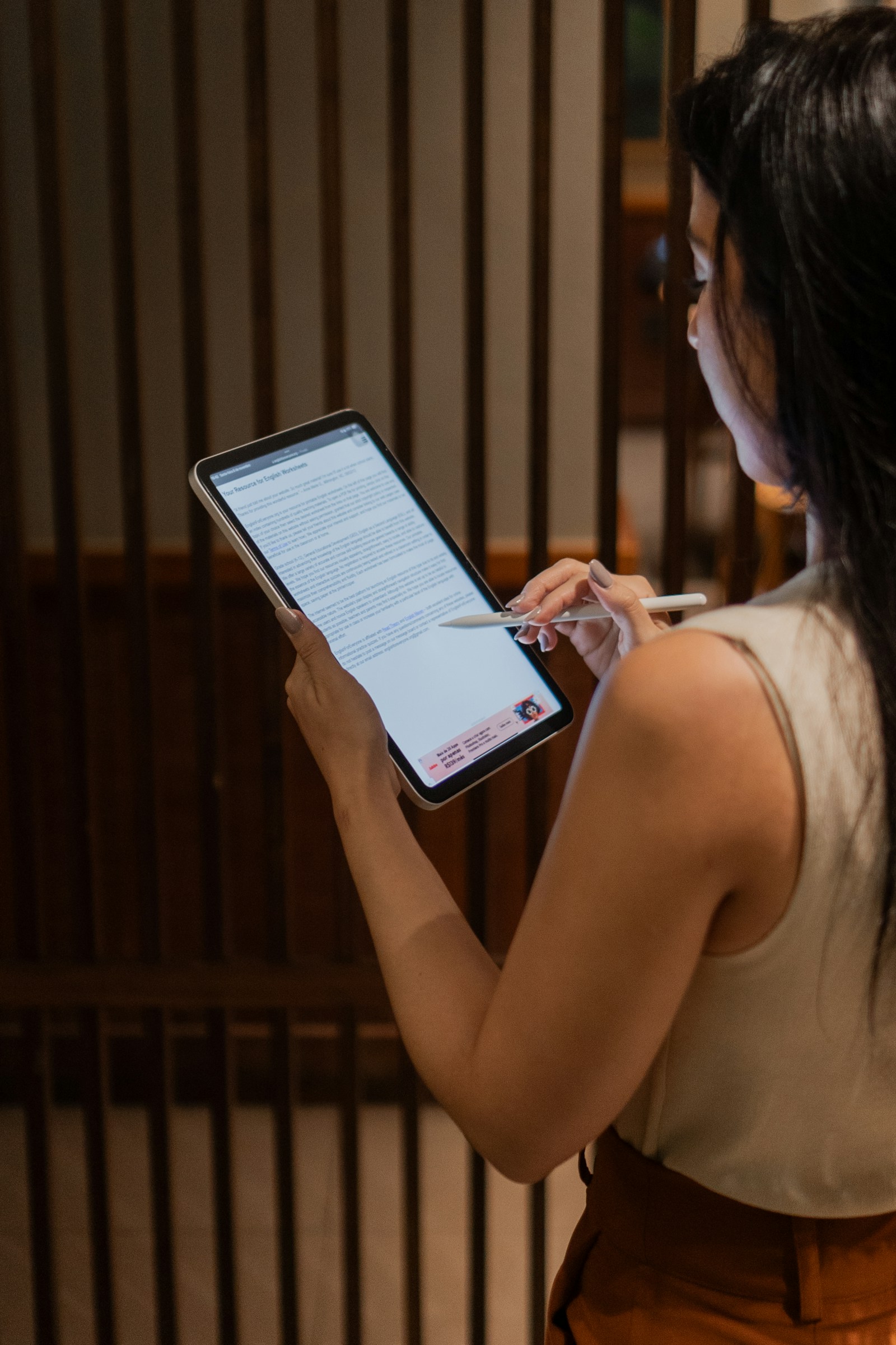 Firm owner reviewing firm metrics on a tablet